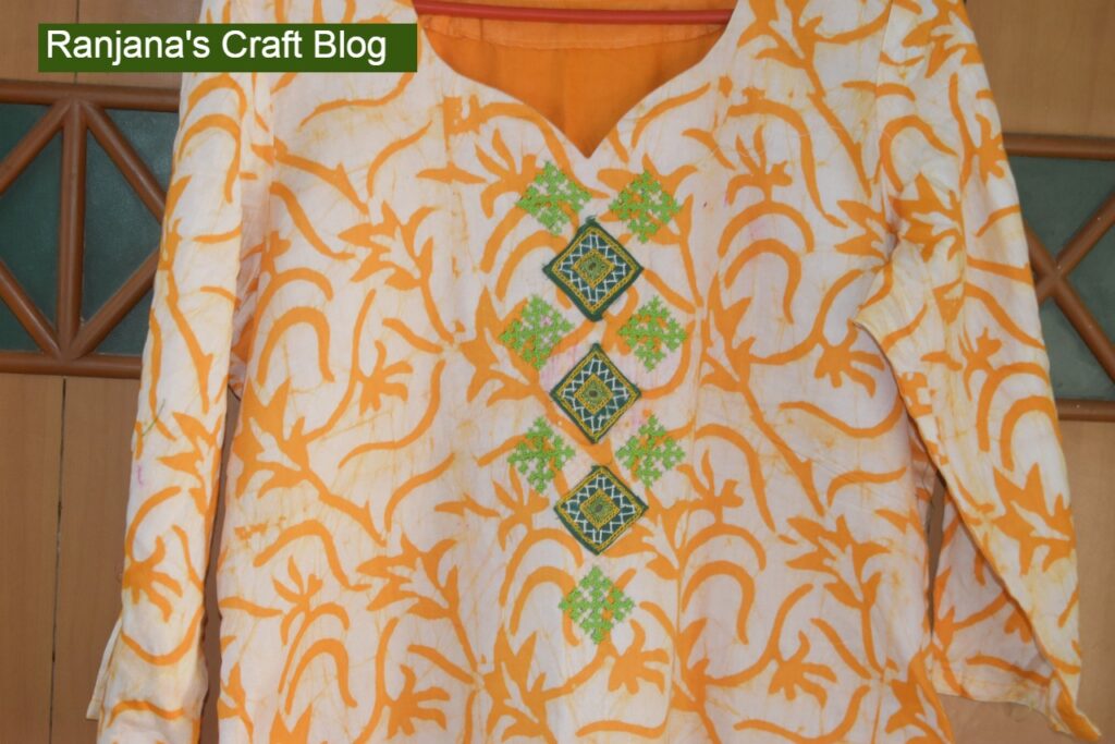 Kutchwork on printed fabric
