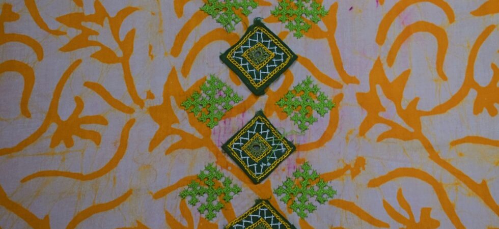 Kutchwork on printed fabric