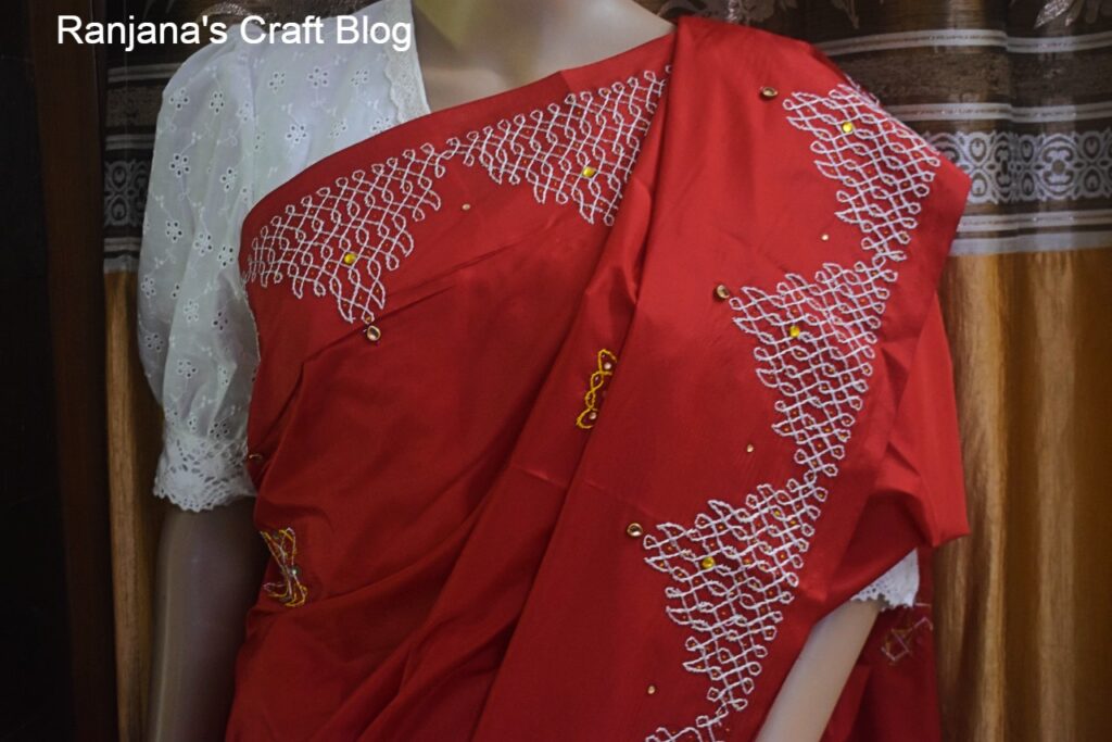 Kolam design embroidery on the saree