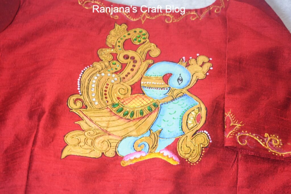 Tanjore painting on the blouse